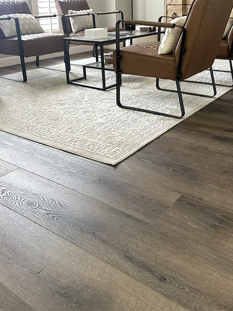 Luxury vinyl plank flooring in San Antonio living room with modern furniture