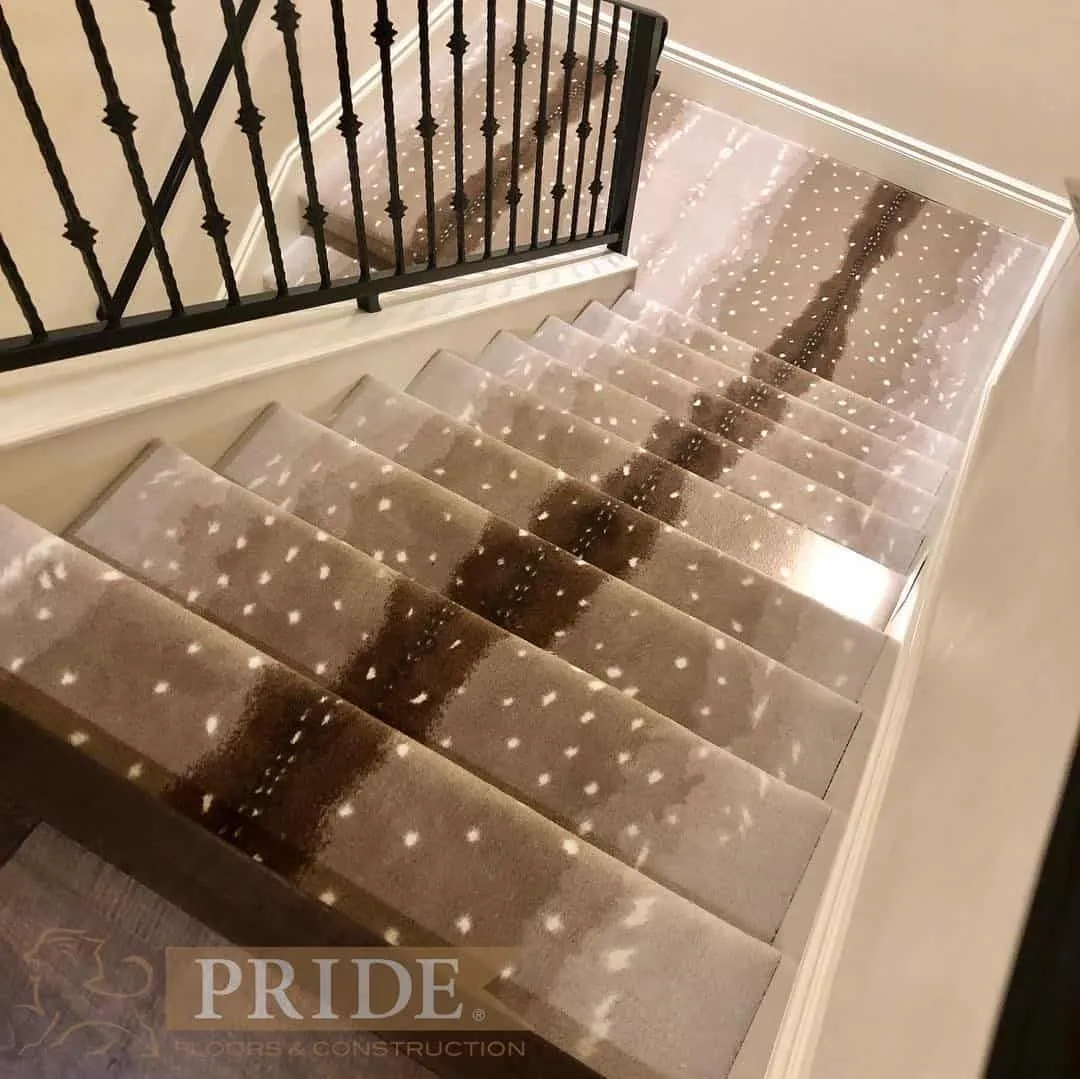 Exotic animal print carpet on stairwell by Pride Floors