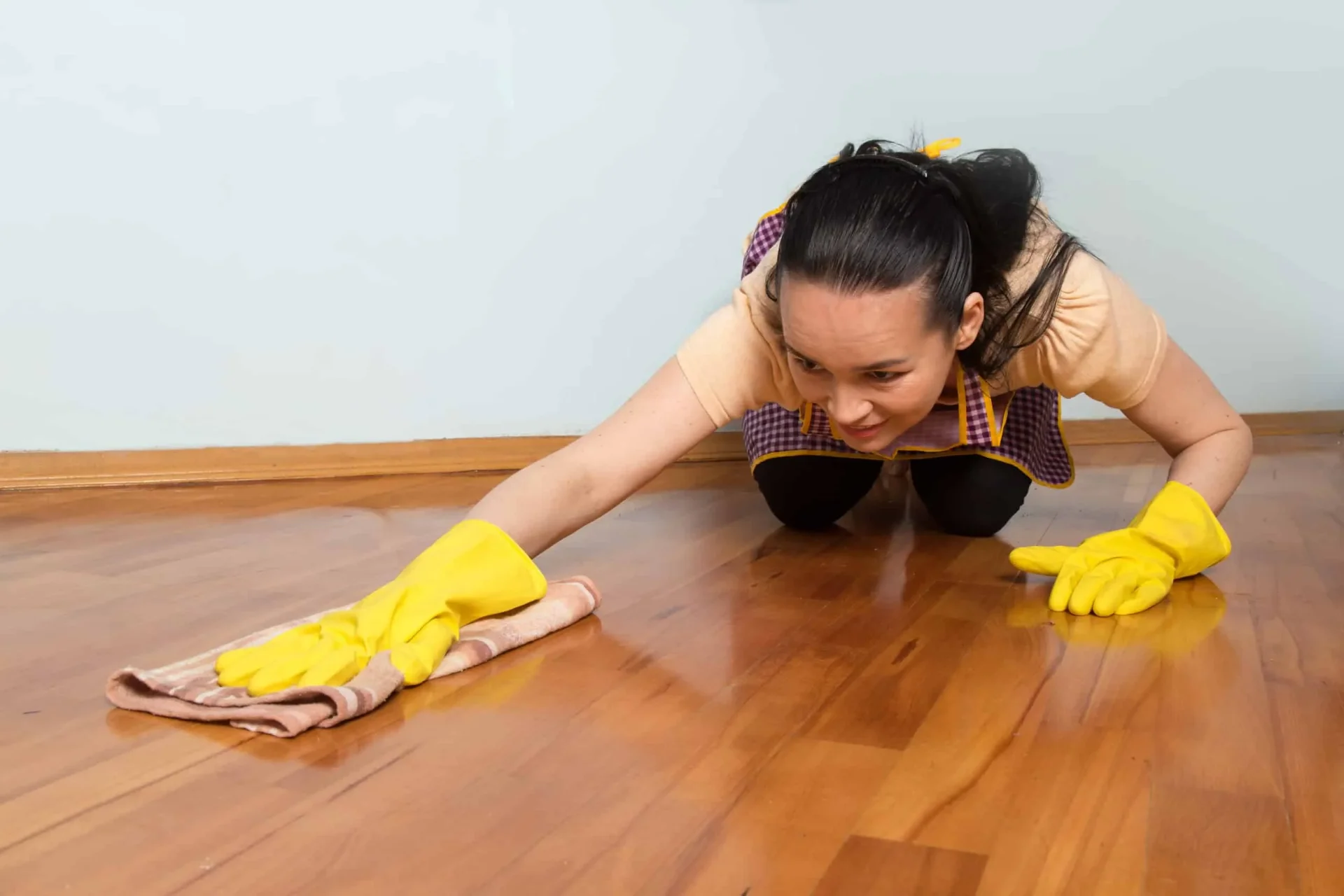 Professional hardwood floor cleaning and maintenance in San Antonio home