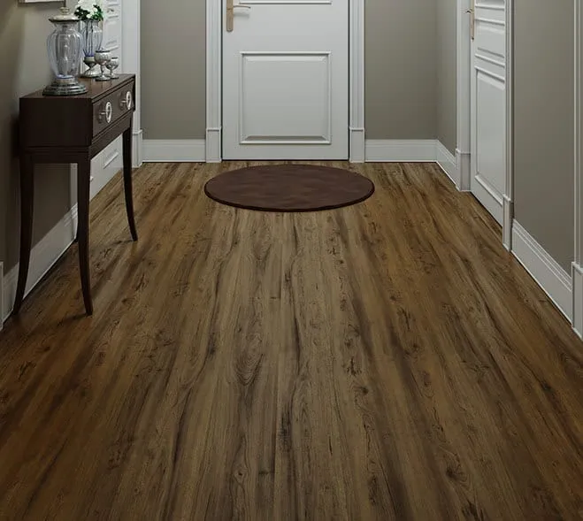 Protective entryway mat on hardwood flooring to prevent scratches