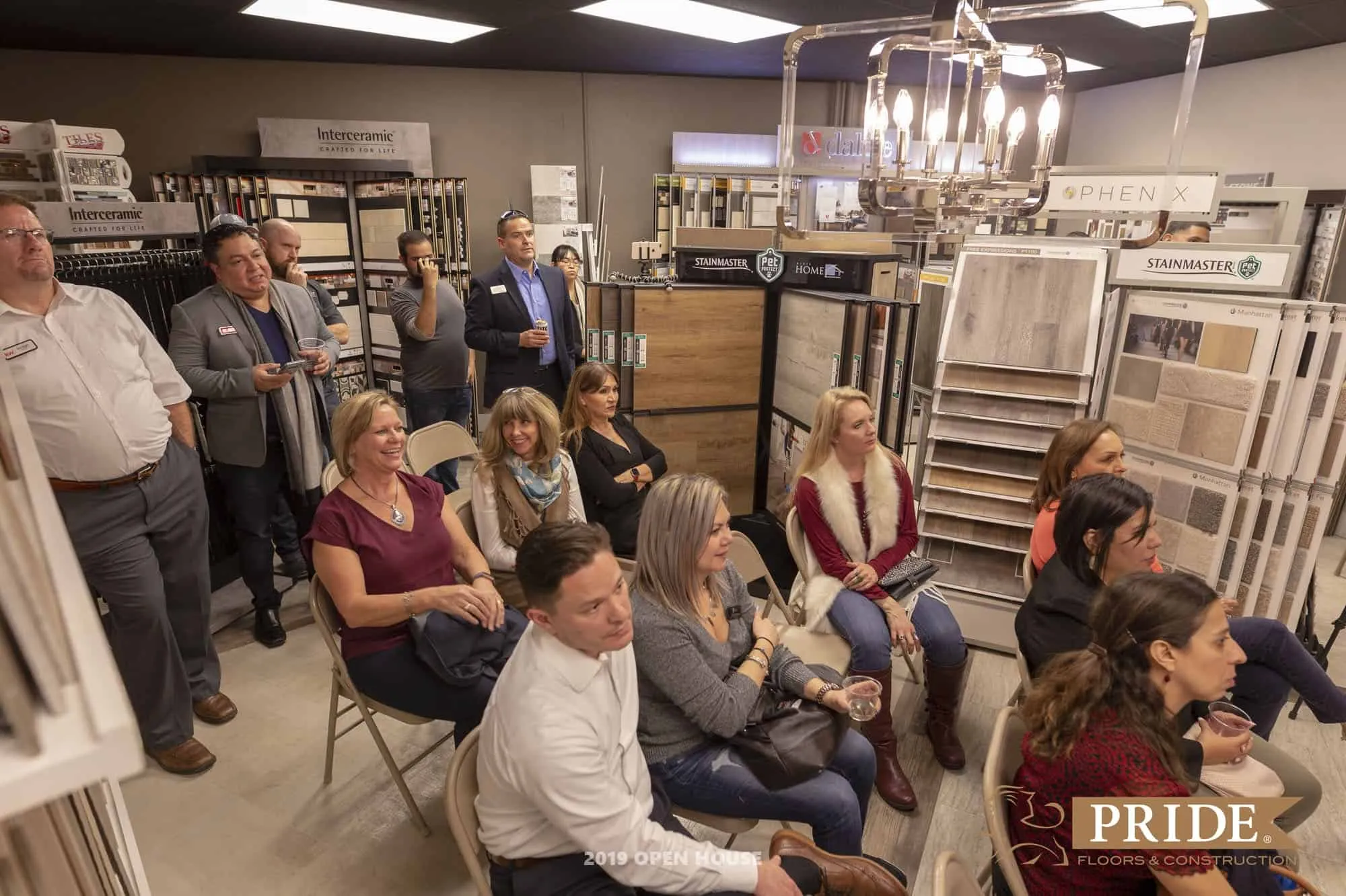 Pride Floors 2019 open house event with attendees in showroom
