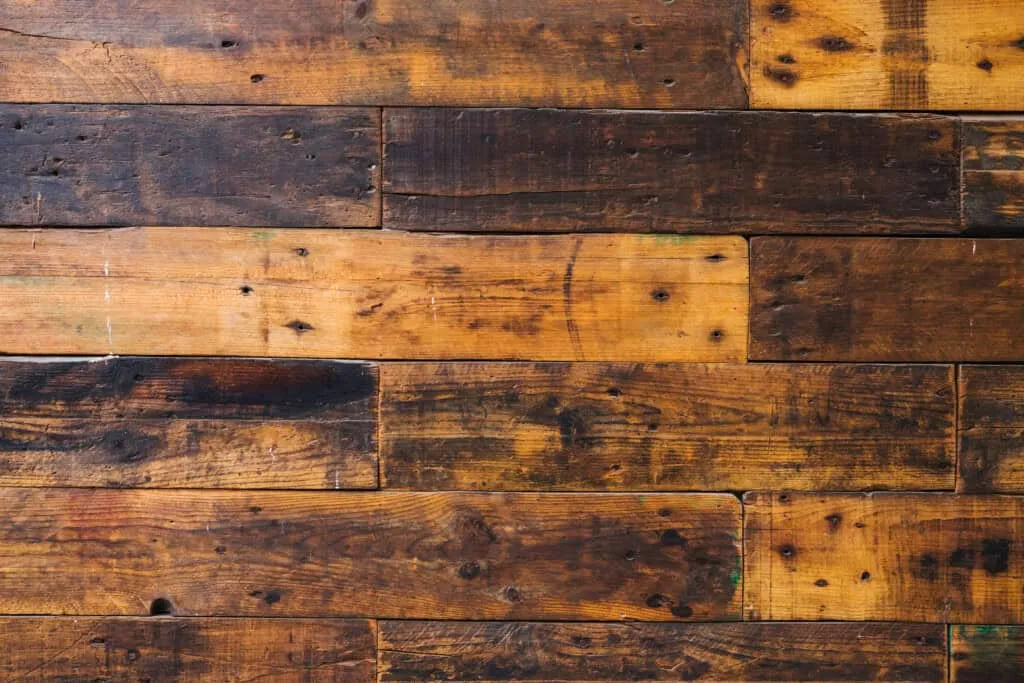 Rustic reclaimed wood flooring texture with natural aged patina
