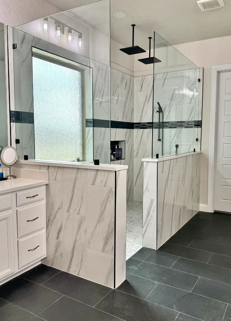 Curbless walk-in shower with mosaic floor