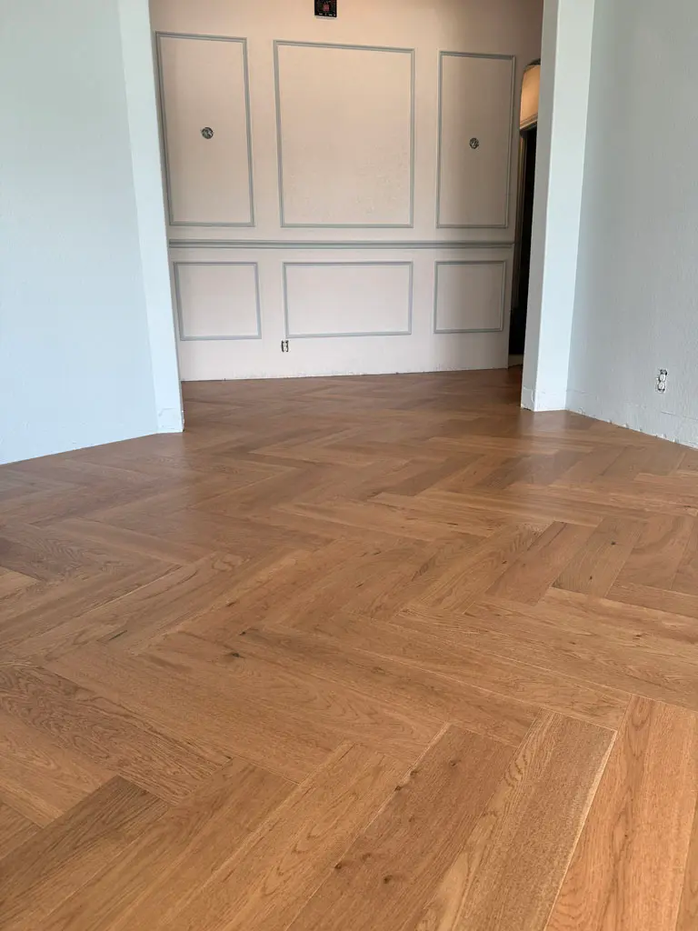 LM Flooring Duet Collection - Herringbone Cleo's Fervor Wood flooring installation in San Antonio, TX by Pride Floors