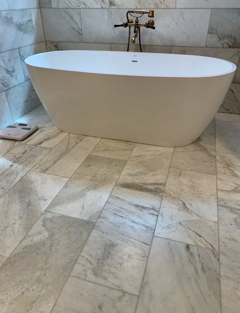 Custom Remodel Freestanding Tub Suite Marble & Chrome Bathroom Remodeling & Tile flooring installation in San Antonio, TX by Pride Floors