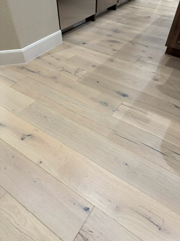 Provenza Floors Old World Collection Fossil Stone Wood flooring installation in San Antonio, TX by Pride Floors