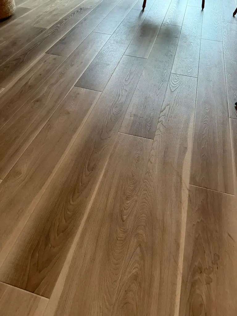 Titan Surfaces Genesis Farmhouse Hickory LVP flooring installation in San Antonio, TX by Pride Floors