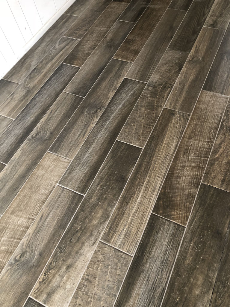https://pride-floors.com/wp-content/uploads/2019/10/tile-plank-installation-08.jpg