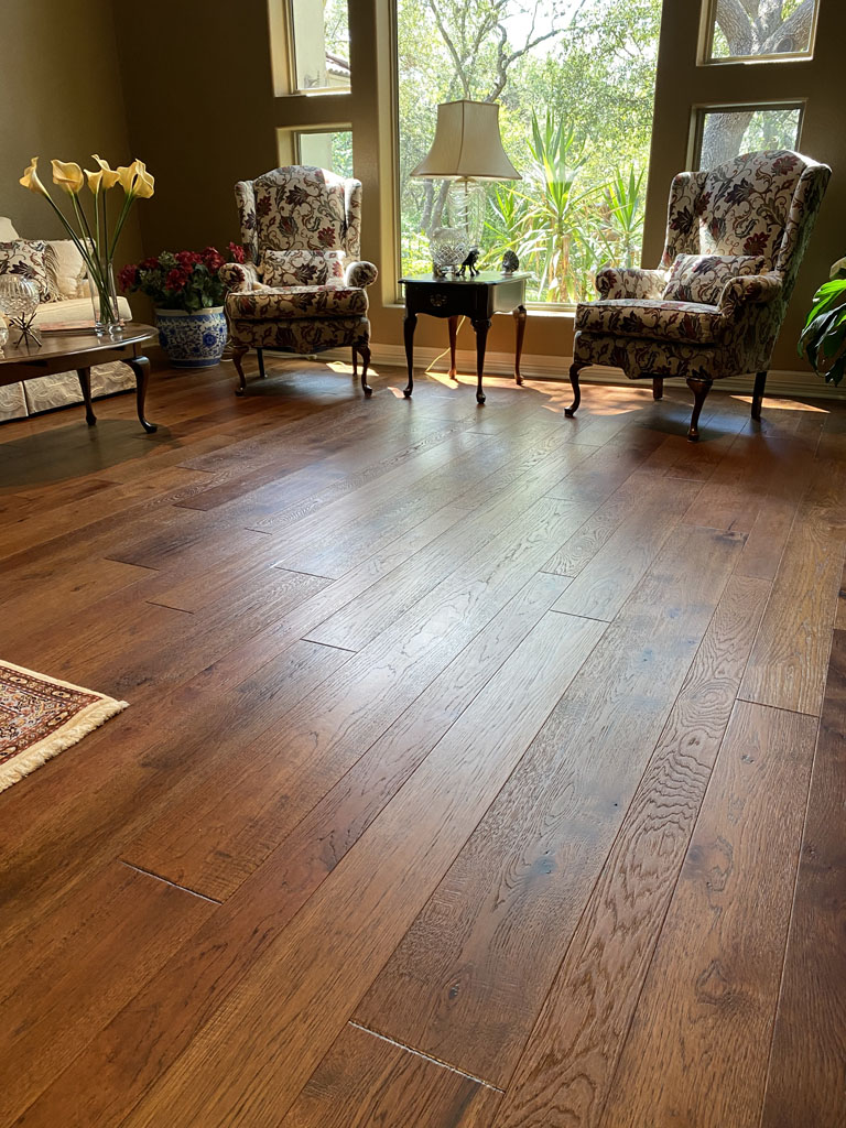 Photo of a hardwood flooring installed in a living room
