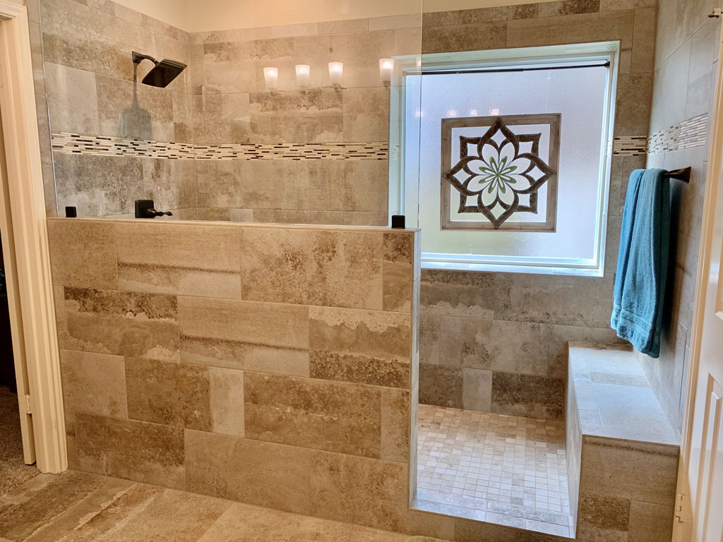 Photo of a bathroom remodel of a stand-in shower with shower tile